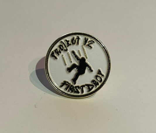 Exclusive "First Drop" Pin Badge